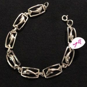 .925 sterling silver solid dolphin bracelet.